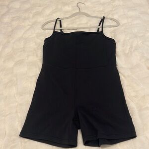 Fairly new Aritzia black athletic romper, size L